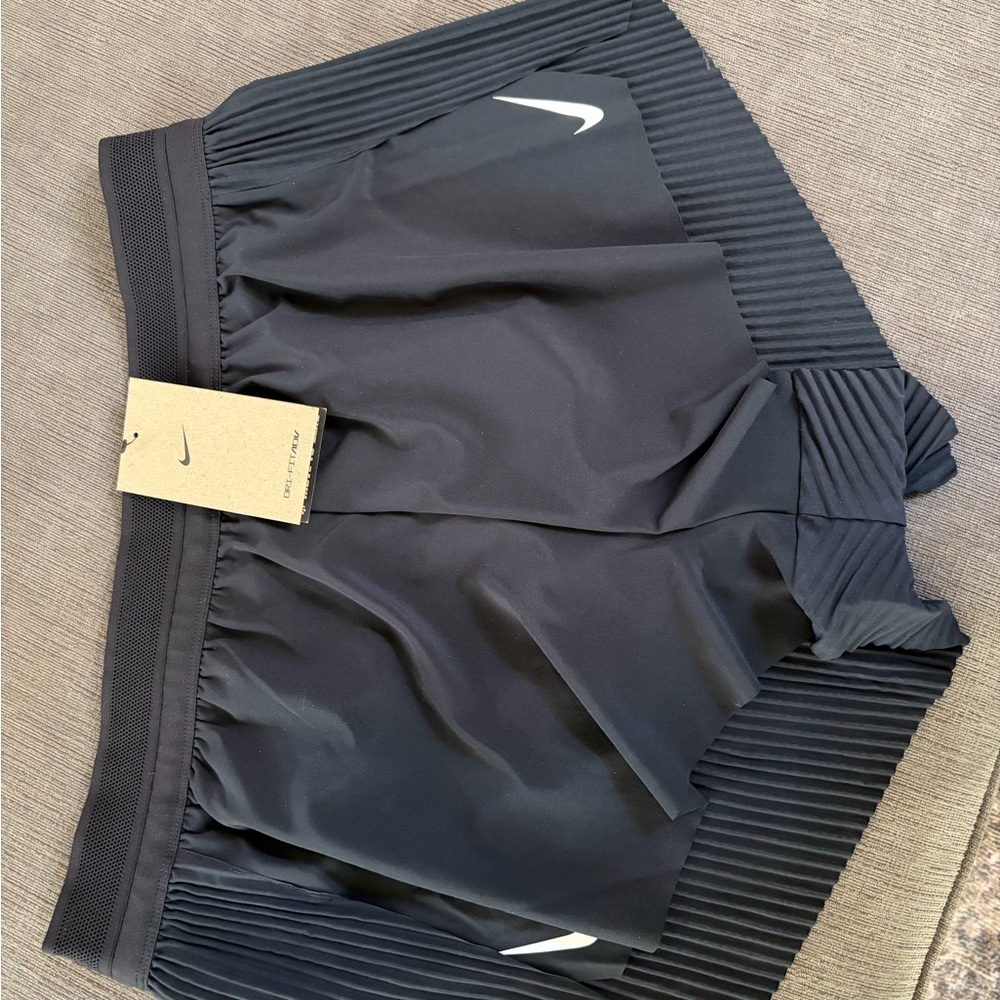 Nike Black Women's Pleated Athletic Shorts with White Swoosh